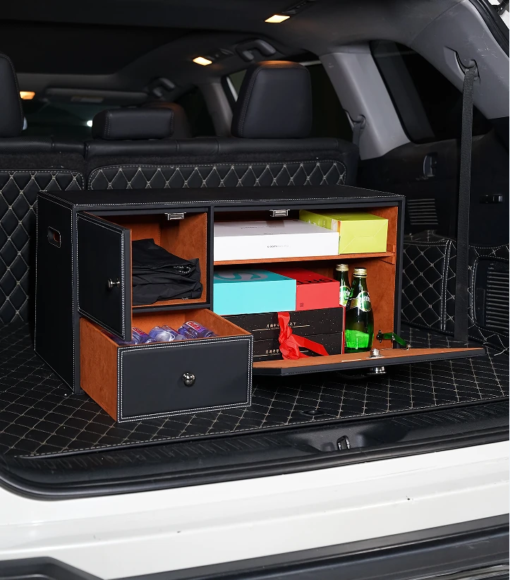 Open black automotive storage cabinet with fitted compartments